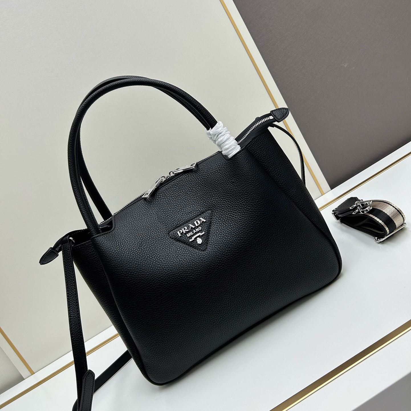 Pra*a top handle bags